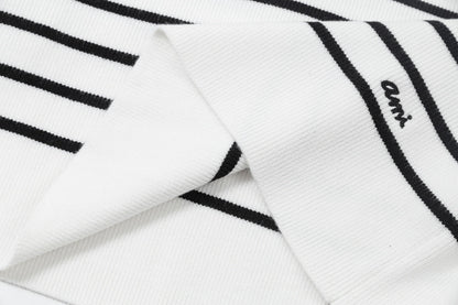 AMI PARIS Cotton and wool striped sweater